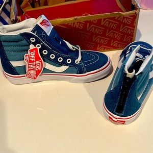 Denim kids vans 2 toned denim blue very easy to get on  because of the zippers